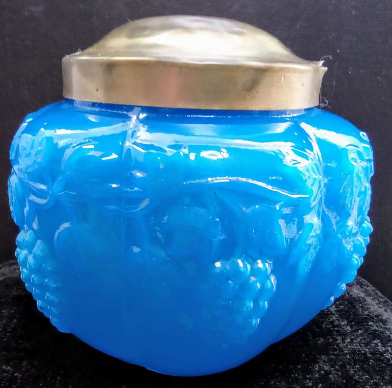 Beautiful vintage blue glass bowl with metal oid