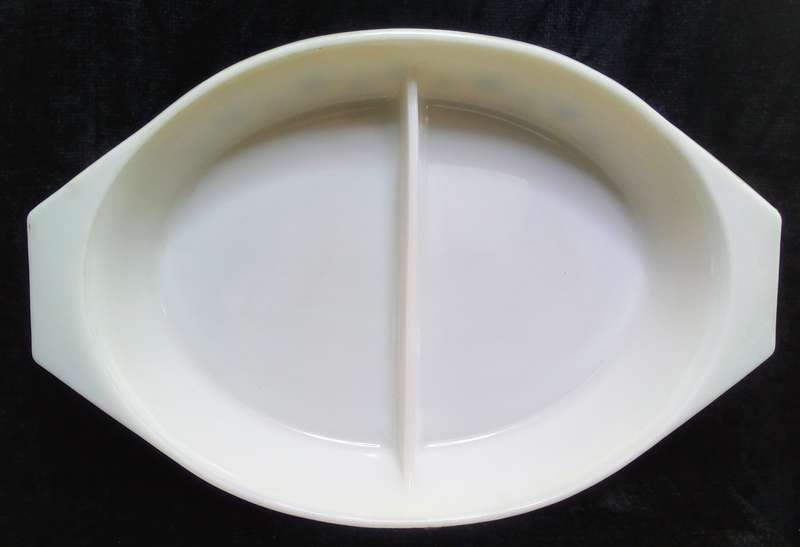 Charming vintage Pyrex Gaiety snowflake lemon yellow oval divided casserole dish