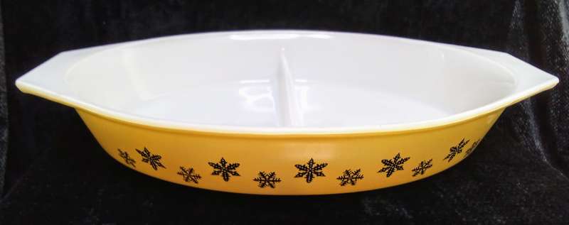 Charming vintage Pyrex Gaiety snowflake lemon yellow oval divided casserole dish