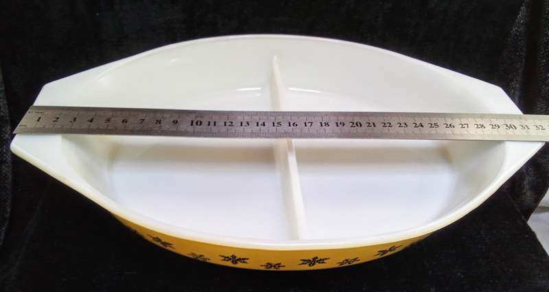 Charming vintage Pyrex Gaiety snowflake lemon yellow oval divided casserole dish