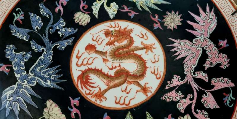 Chinese Handpainted black bowl with red dragon and differen colour Phoenix (Stamped)