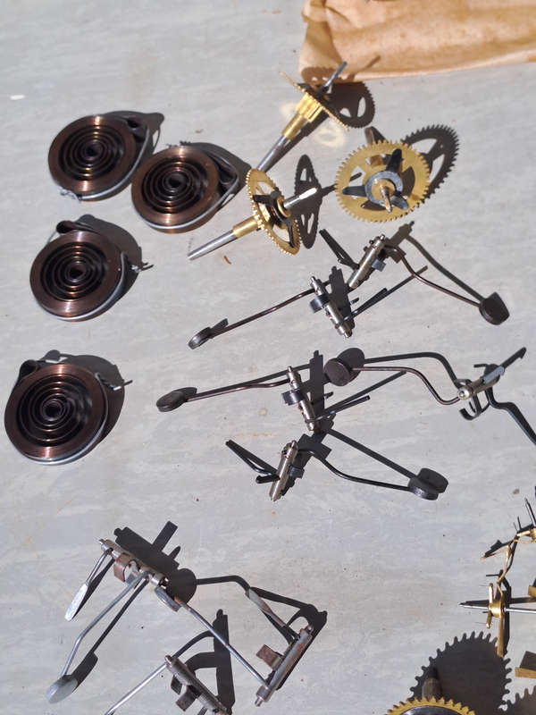 Job lot of new clock spares