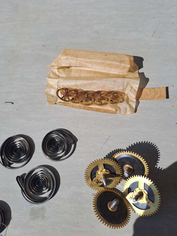 Lot 2 various clock parts all new old stock