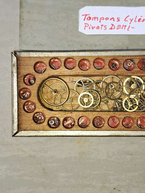 watch parts Lot says Tampons cylinders , pivots, deml