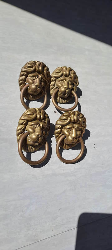 Vintage brass lion head pull handles