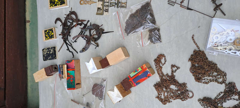 large lot of Cuckoo clock parts, chains, bellows, hands, etc