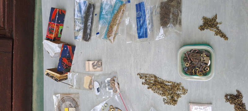 large lot of Cuckoo clock parts, chains, bellows, hands, etc