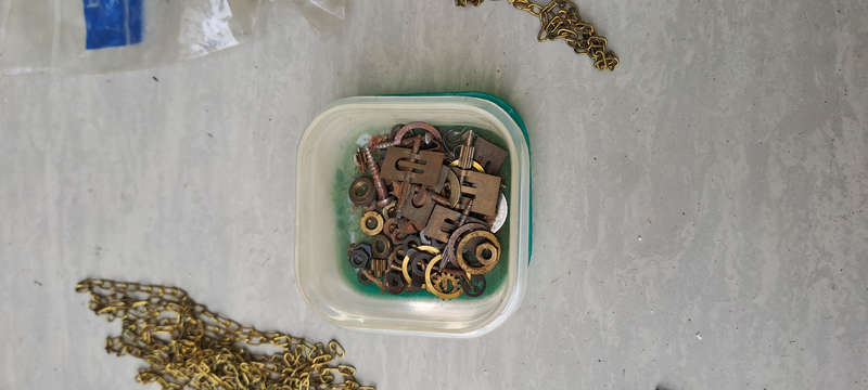 large lot of Cuckoo clock parts, chains, bellows, hands, etc