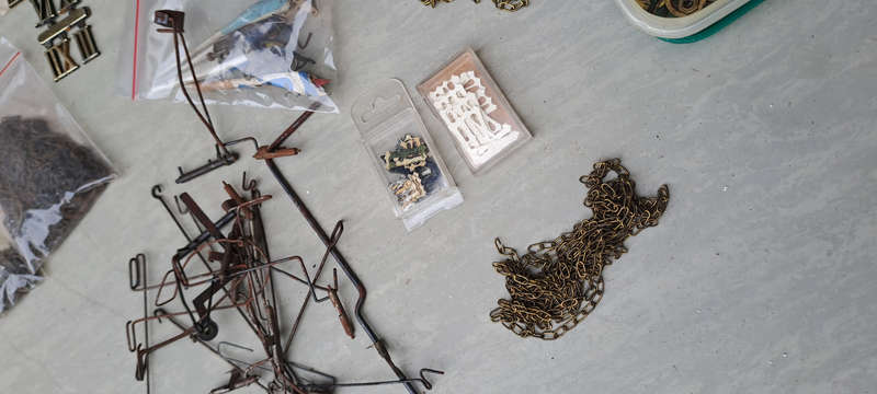 large lot of Cuckoo clock parts, chains, bellows, hands, etc