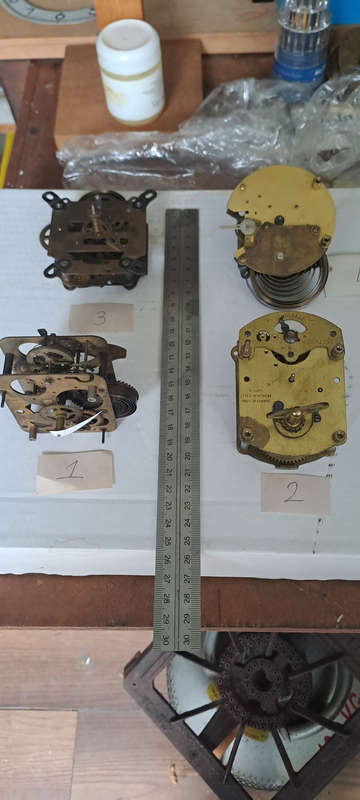 Lot 2 small clock movements one ticking others I dont know