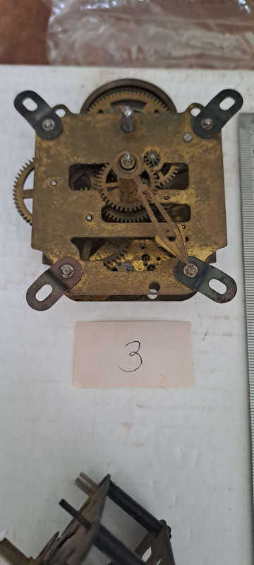 Lot 2 small clock movements one ticking others I dont know