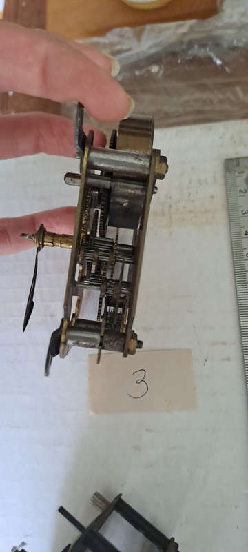 Lot 2 small clock movements one ticking others I dont know
