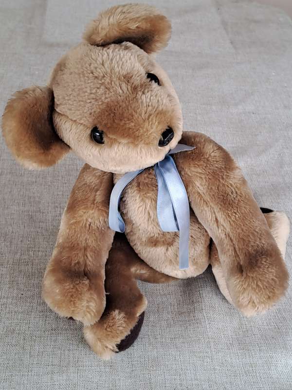 Plush Brown Bear with Blue Ribbon