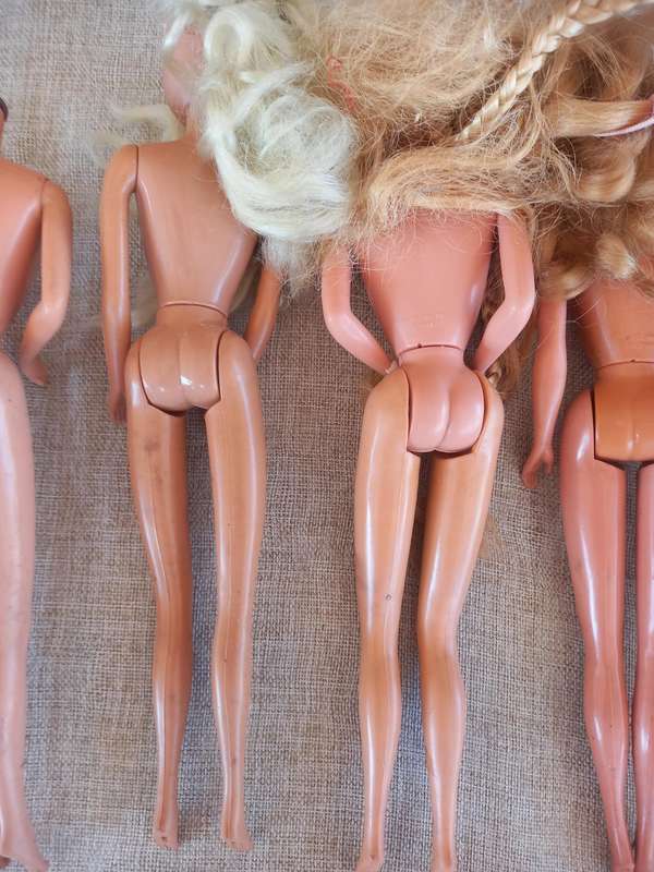 Barbies and Ken and spares