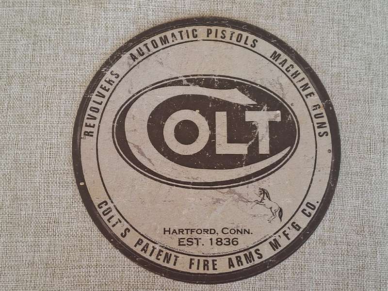 Colt Revolvers, Automatic Pistols, Machine Guns - Circular Advertising Tin Plate Sign