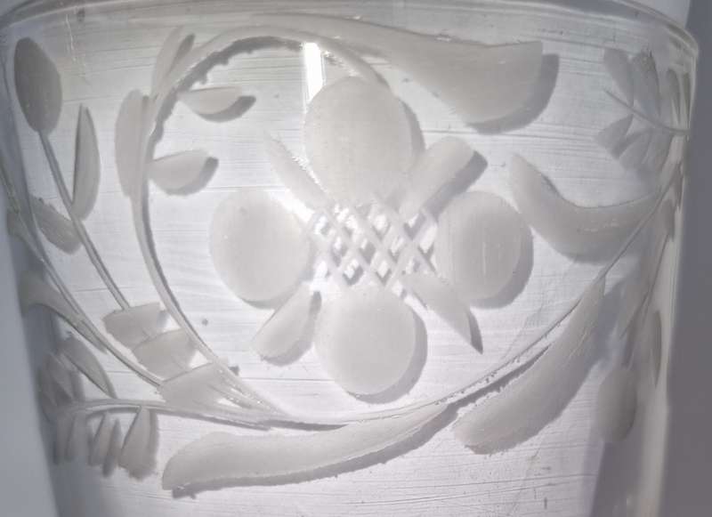 18th Century English engraved bowl glass with air-twist stem and white twist stem.