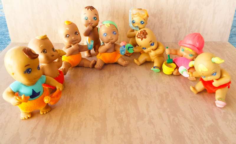 9 Vintage Baby Figurines as  1 lot