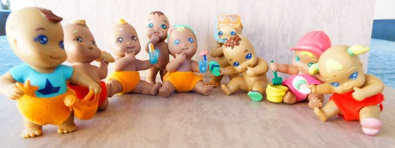 9 Vintage Baby Figurines as  1 lot
