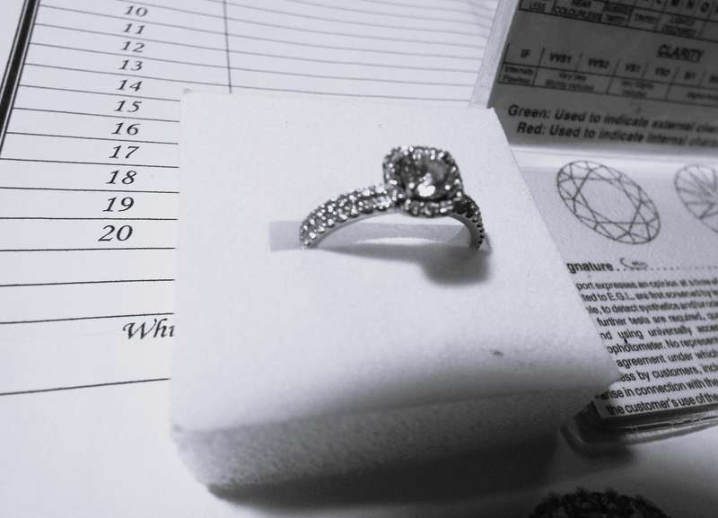 Diamond Halo Ring with 0.56 ct EGL Certified Round Brilliant Cut Diamond, 1.08 ct Total Weight