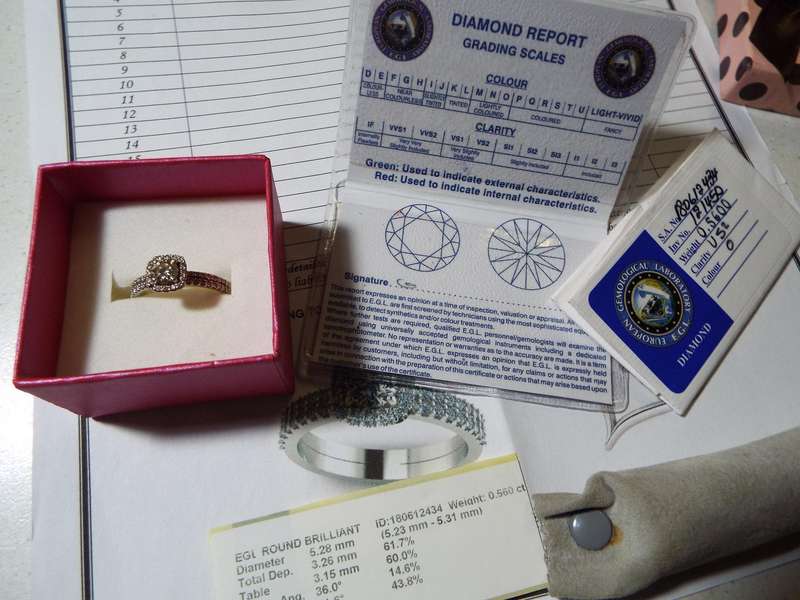 Diamond Halo Ring with 0.56 ct EGL Certified Round Brilliant Cut Diamond, 1.08 ct Total Weight
