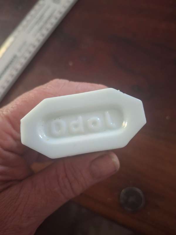 Milk glass tooth paste bottle
