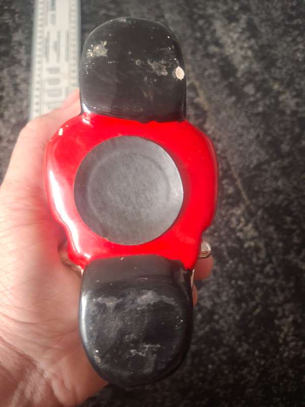 Red piggy bank motorbike