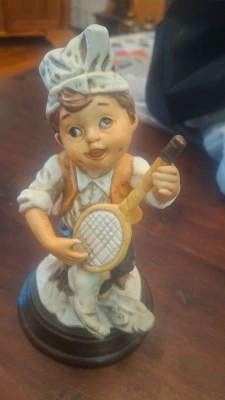 Vintage boy figurine
