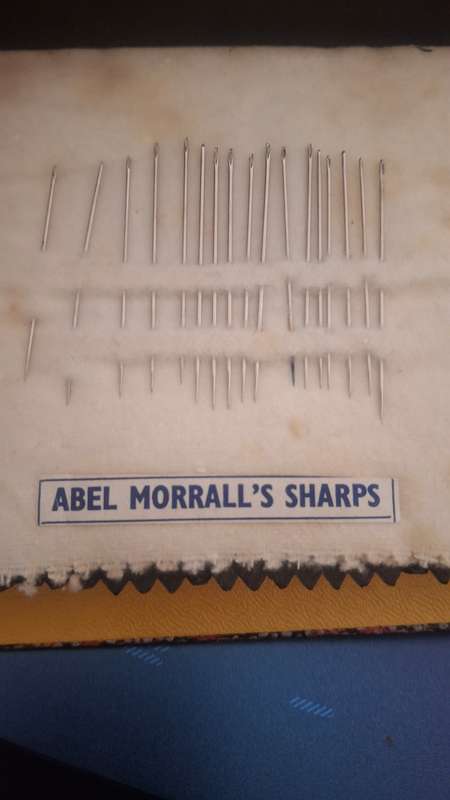 Vintage needle case book with original needles