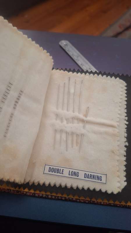 Vintage needle case book with original needles