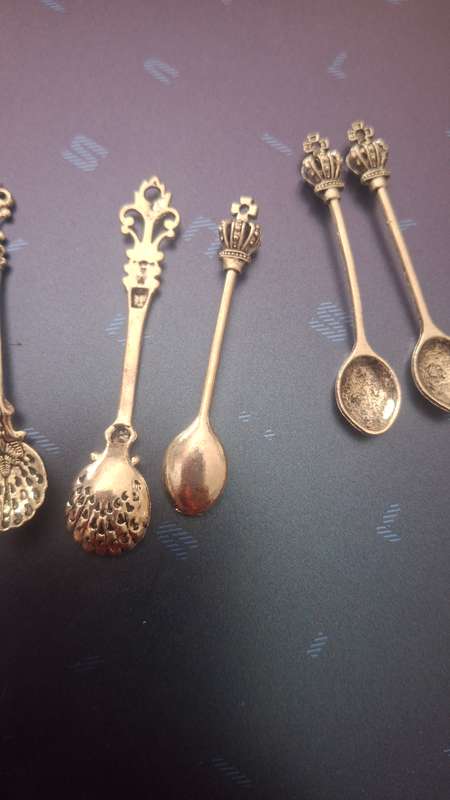 Small ornamental spoons x 8