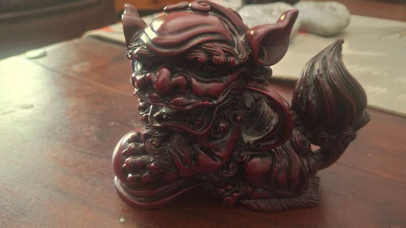 Chinese Carved Red Resin Foo Dogs
