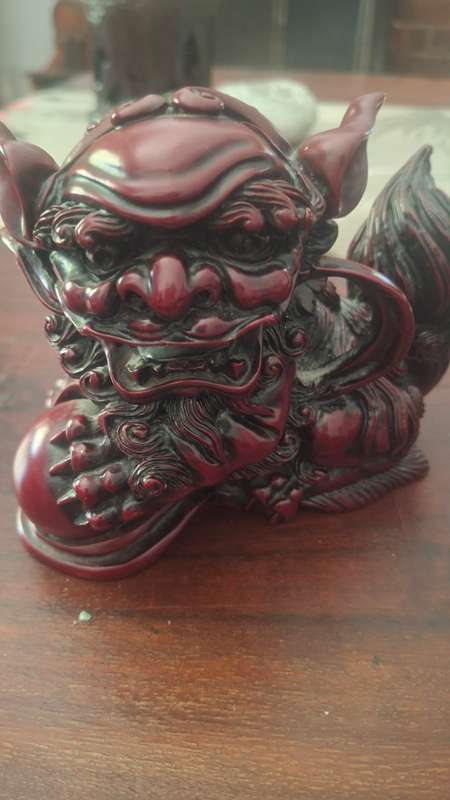 Chinese Carved Red Resin Foo Dogs