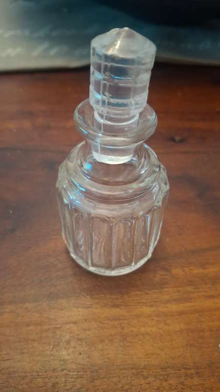 Glass bottle with top