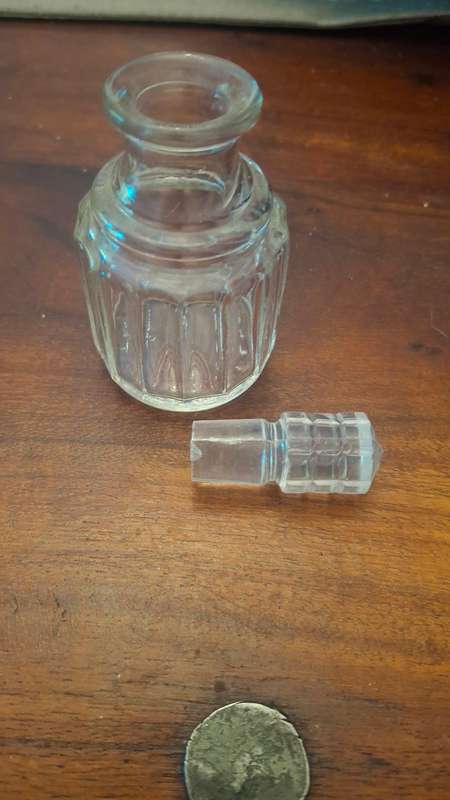 Glass bottle with top