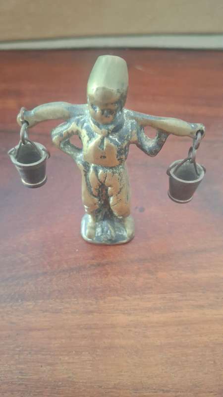 Dutch boy brass vintage