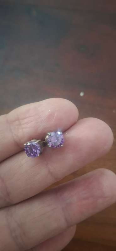 Sterling silver earrings with purple stone
