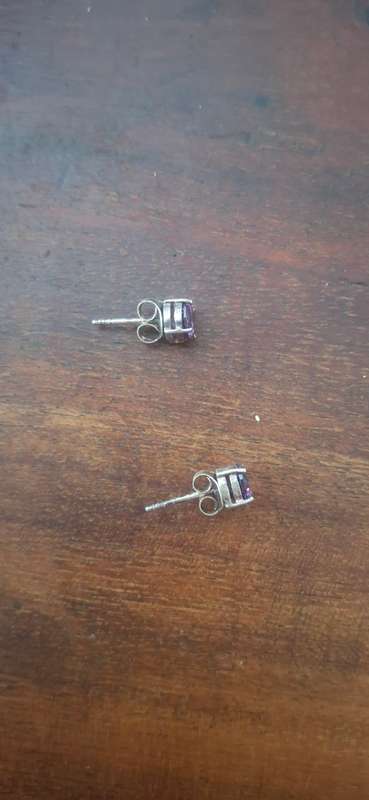 Sterling silver earrings with purple stone