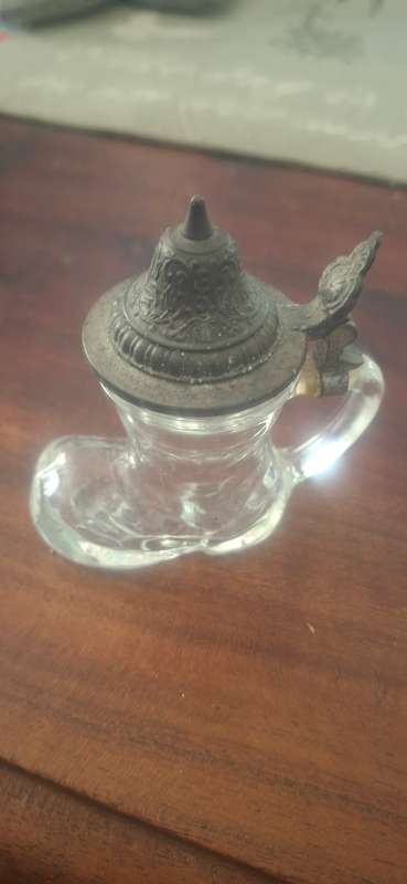 German shaped like a boot with a pewter lid.