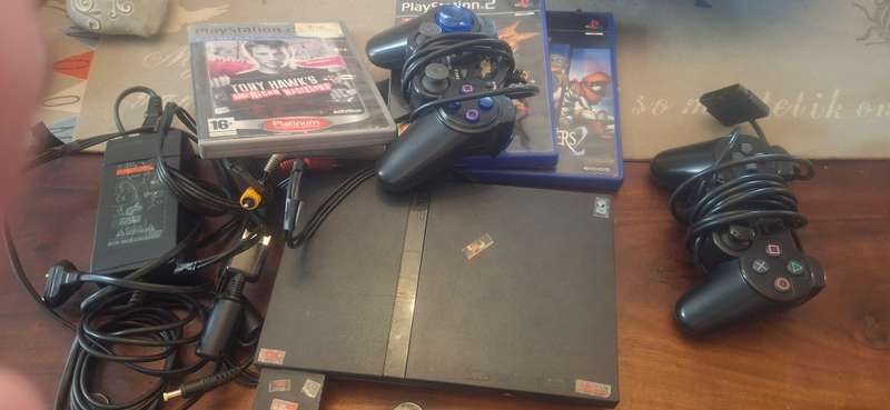 Playstation 2 with 3 games