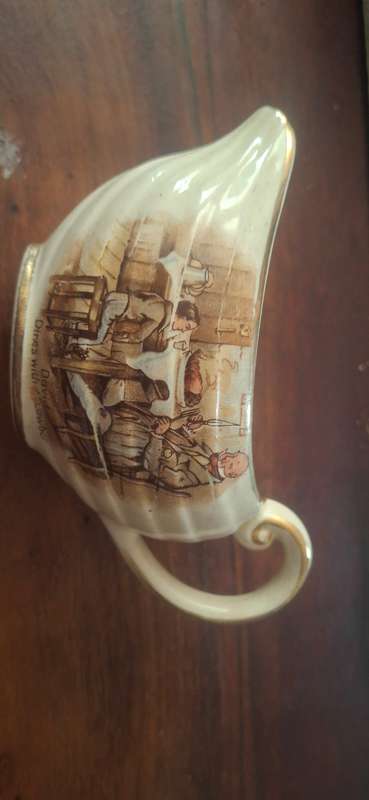 Porcelain vintage cream cup