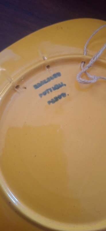 Vintage yellow plate with pewter work