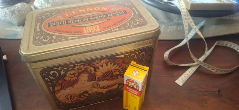 Lennon vintage tin