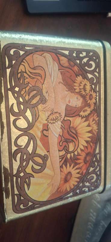 Lennon vintage tin