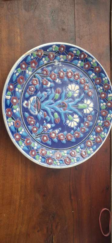 Hand-painted ceramic plate, likely of Greek origin, as indicated by the inscripti