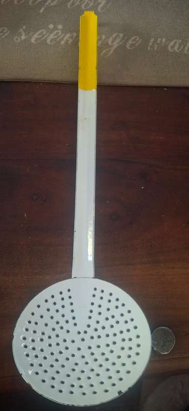 Vintage enamel spoon