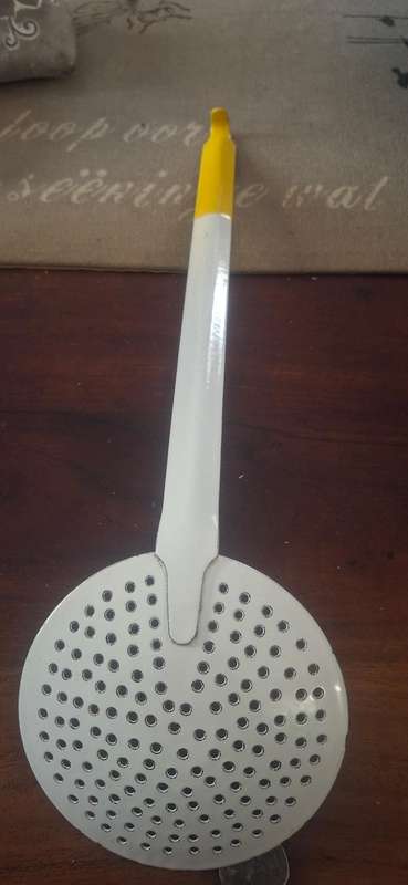 Vintage enamel spoon