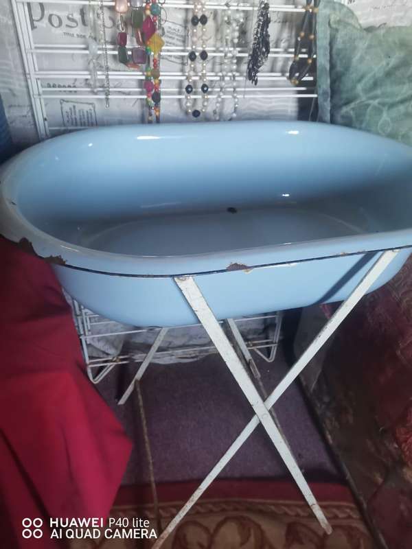 Vintage enamel baby bath on stand