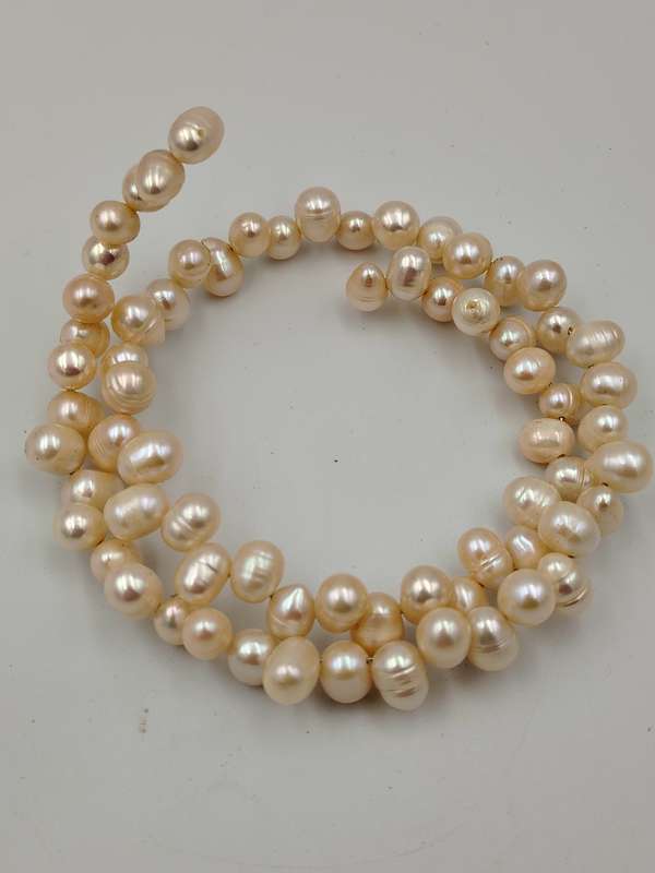 Slight pink genuine pearl wrap around bracelet