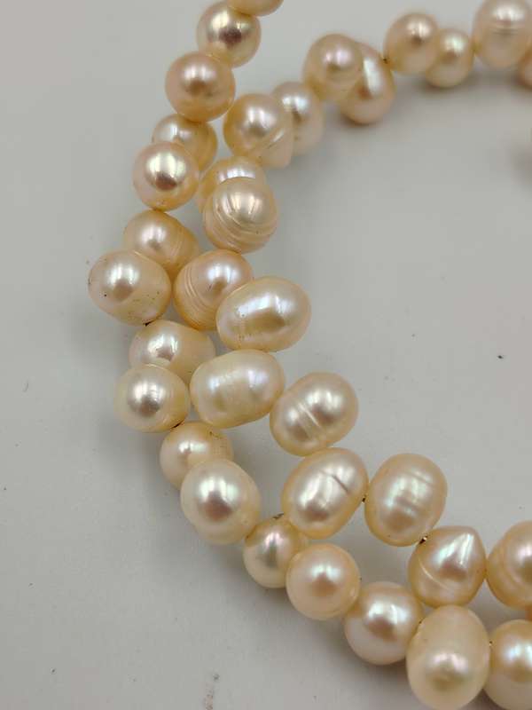 Slight pink genuine pearl wrap around bracelet