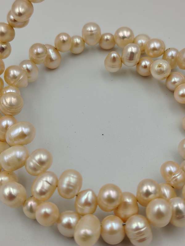Slight pink genuine pearl wrap around bracelet